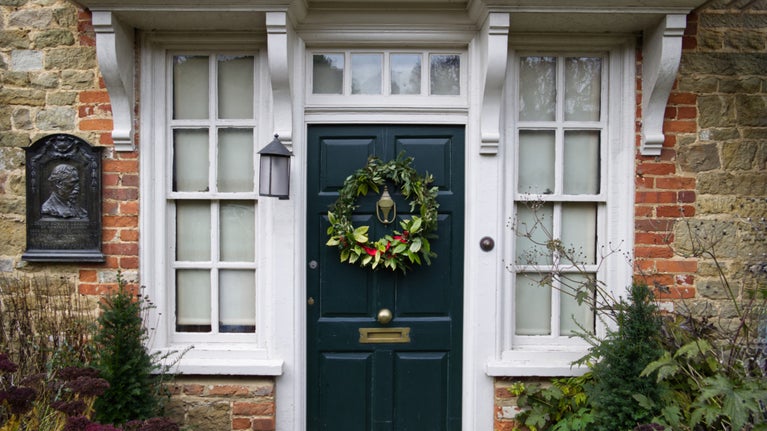 Christmas wreath on the front door at Quebec House, Kent